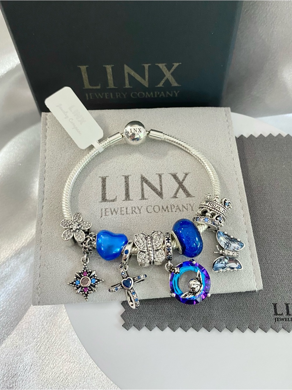 Linx Snake Chain Bracelet with Blue Religious and Butterfly Themed Charms